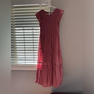 Mauve colored dress.